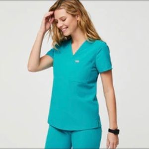 Figs teal top and bottom. XS